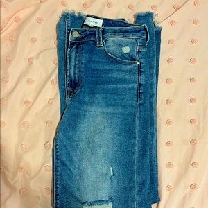 Women’s distressed wide leg risen jeans